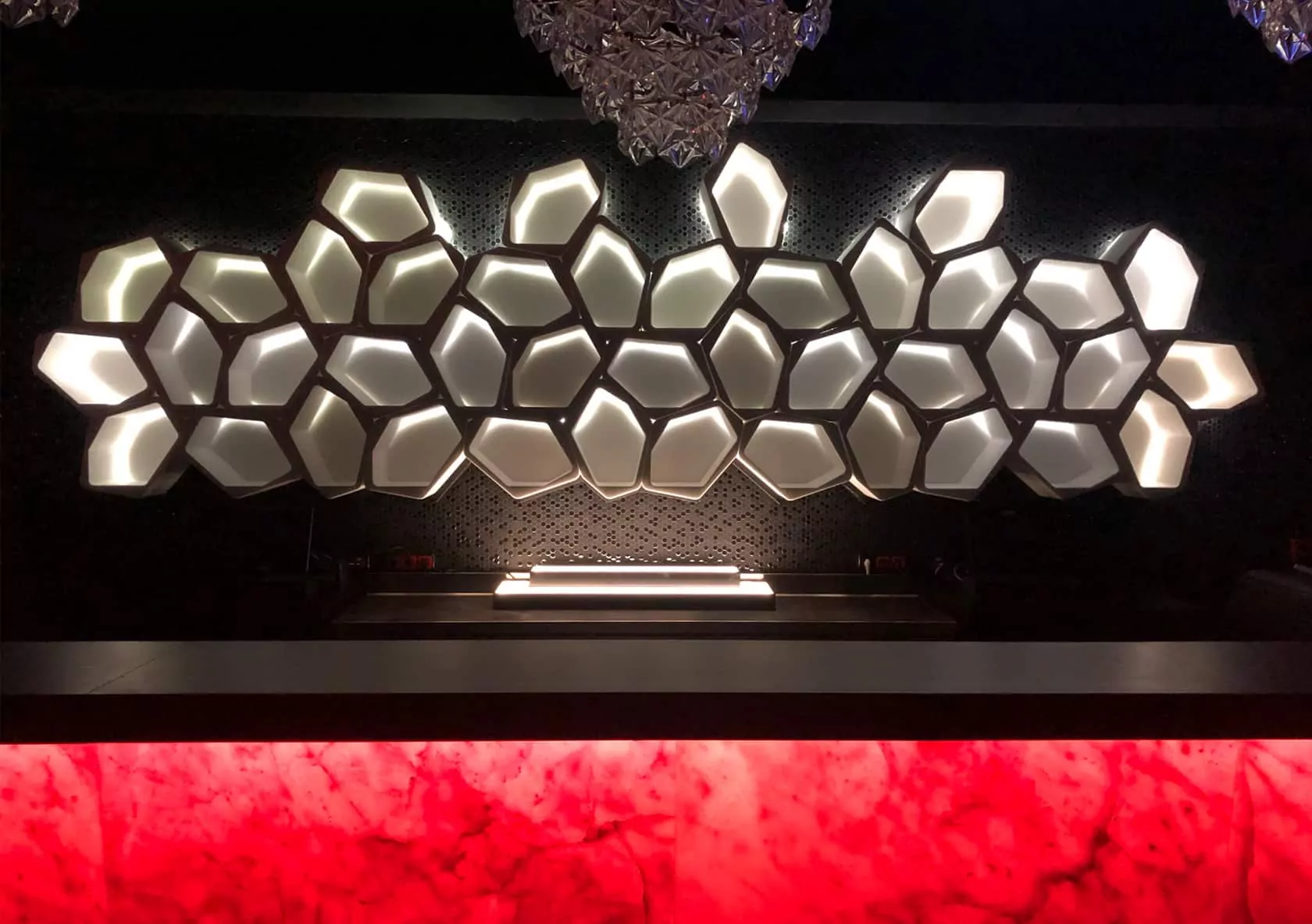modular floating wall shelves with LED backlighting at the BCM club