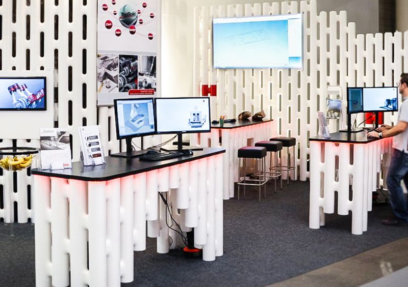 Mobile exhibition wall and room divider with LINK furniture