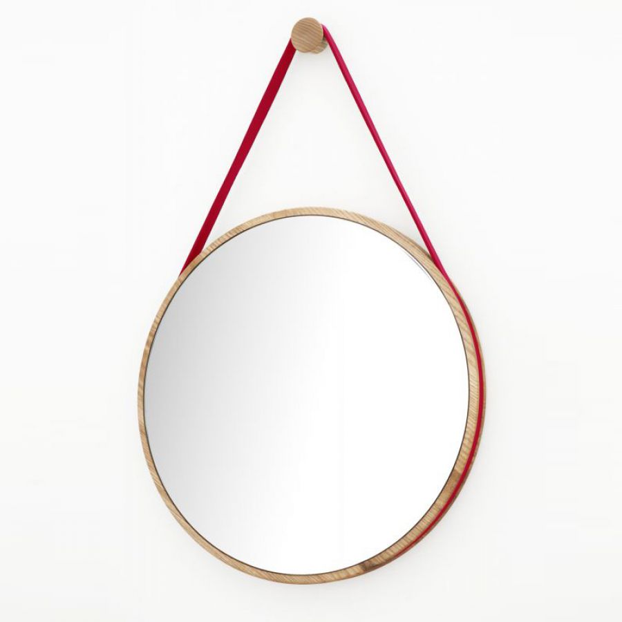 Round mirror with red leather strap